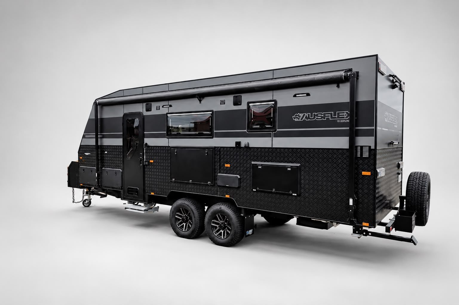 Ausflex Explorer in charcoal, rear three-quarter studio view