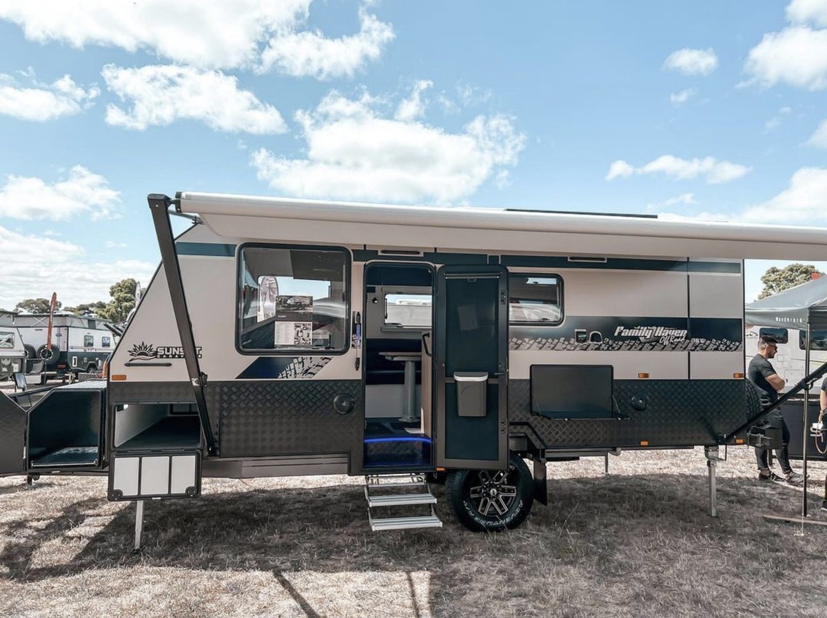 Ausflex on-site caravan render with fold-out deck